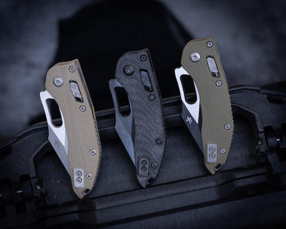 Stitch Ram-Lok Apocalyptic Fluted G-10 Tan Full Serrate 3.75" Blade