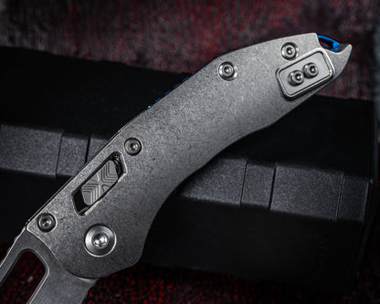 Microtech Marfione Select Stitch Ram-Lok w/ Blue Accent Full Serrated Stonewash Finish Slab Side Titanium