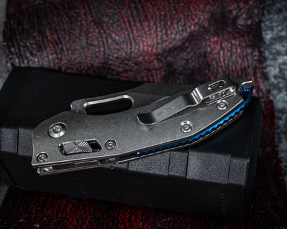 Microtech Marfione Select Stitch Ram-Lok w/ Blue Accent Full Serrated Stonewash Finish Slab Side Titanium